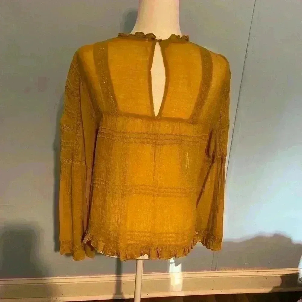 Free People Ladies Bell Sleeve Blouse
Yellow boho ruffle peasant Size Small - Picture 8 of 13